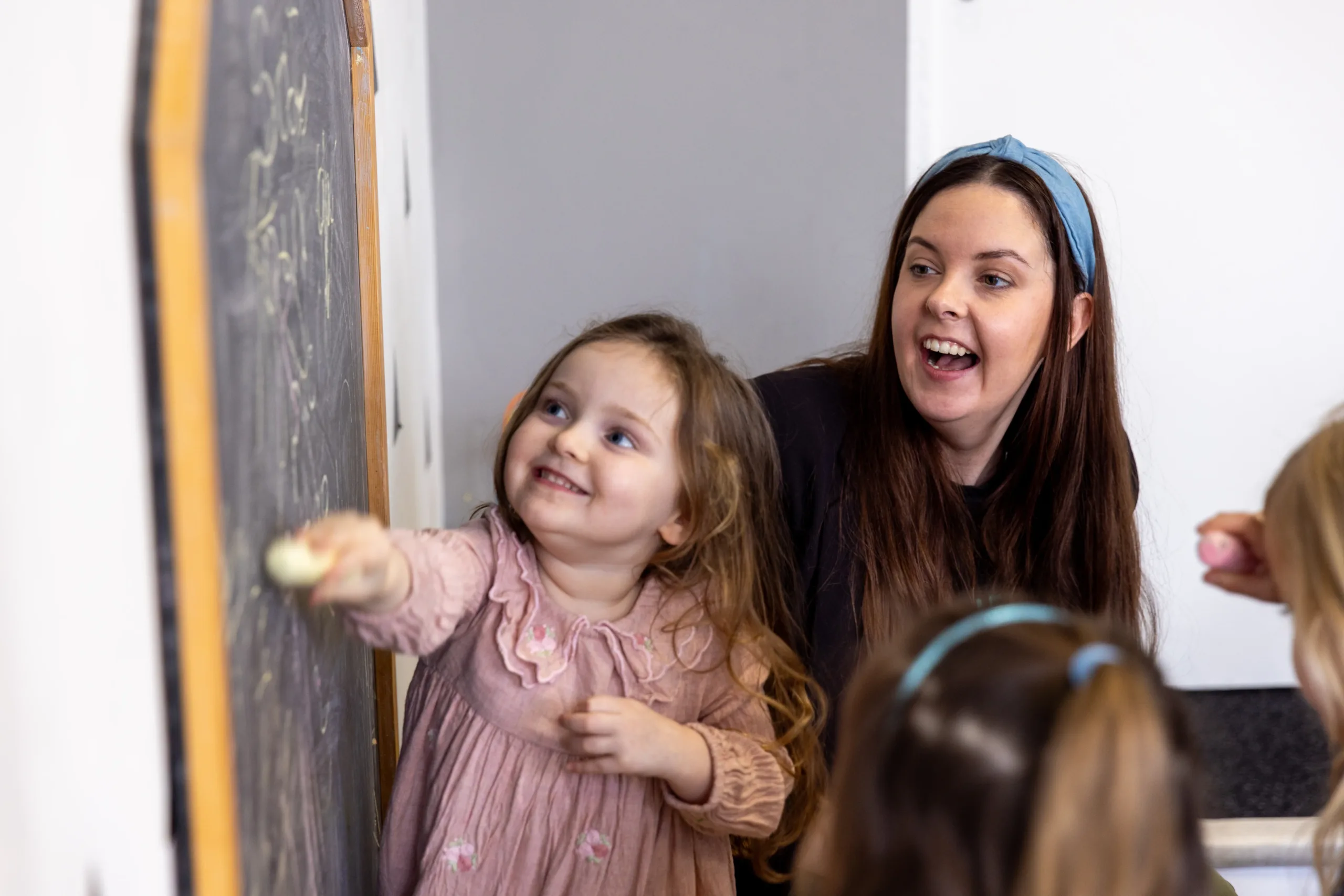 School Roots - Writing on a chalkboard